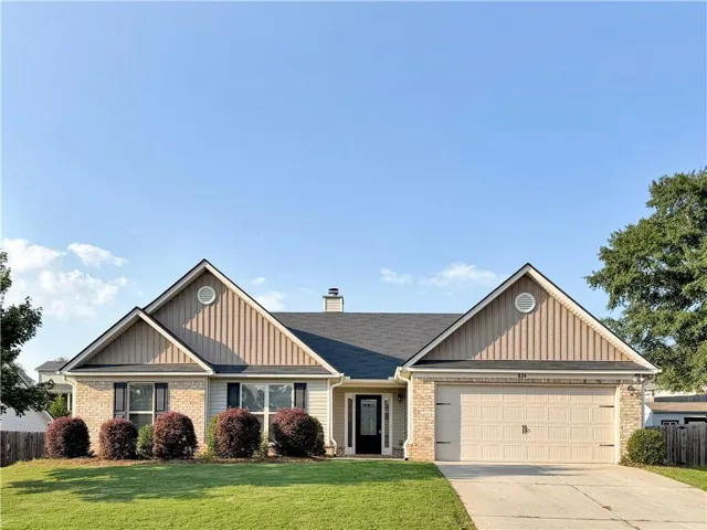 Brick and siding exterior with gabled rooflines