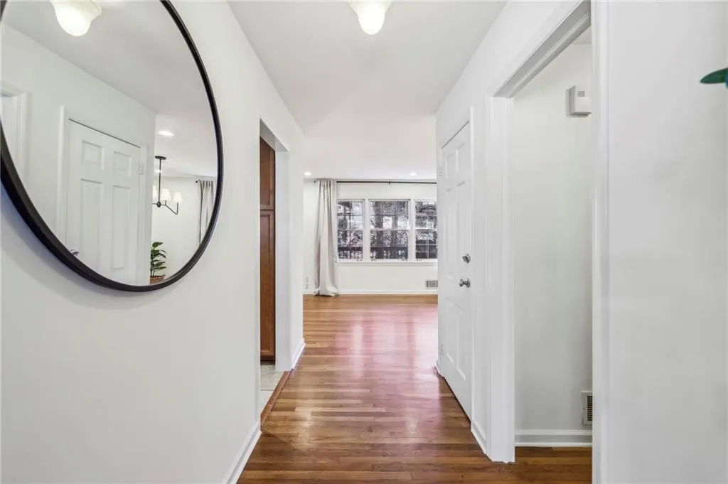 Front foyer greets you with hardwood floors and beautiful views to backyard