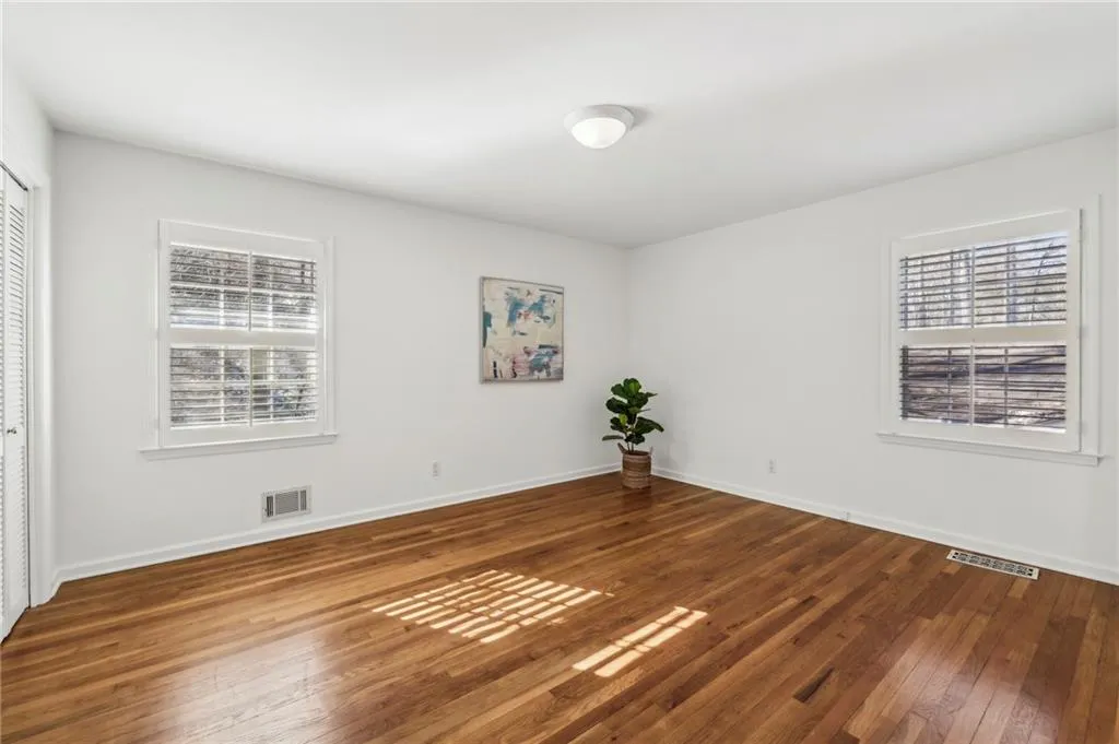 Plantation shutters, double closets and large enough for a king size bed.