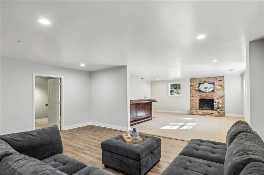 Open concept living for entertaining, an in-law suite, home office or play area for children.