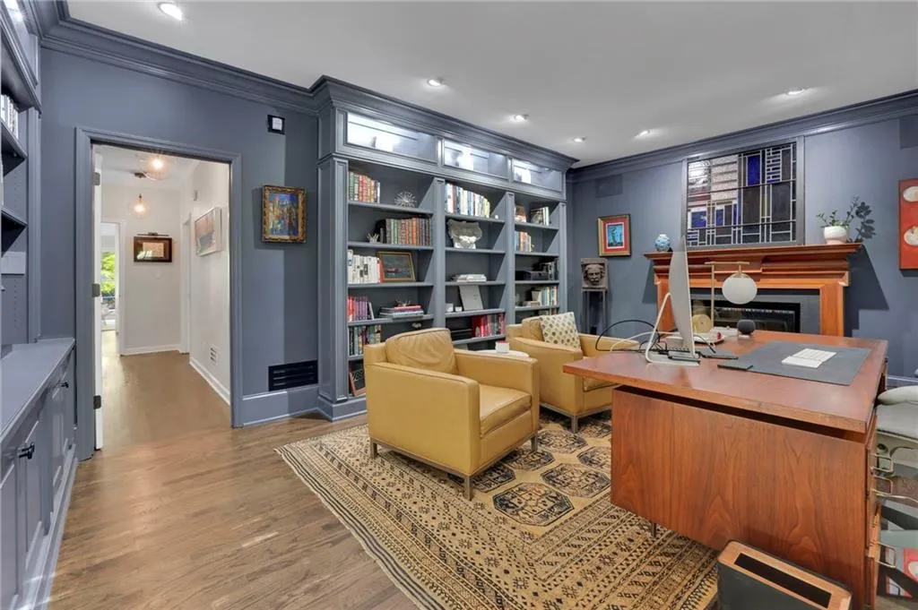 Entrance foyer with french doors, arched walkways, stairs, crown molding, and lofted ceiling