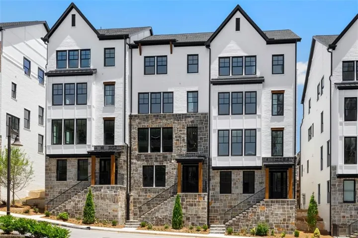 Not Actual townhome: Similar look to townhomes in Lakeview – A stunning new townhome community featuring modern designs, spacious layouts, and high-end finishes. Enjoy luxury living with private outdoor spaces, two-car garages, and prime access to shopping, dining, and entertainment.