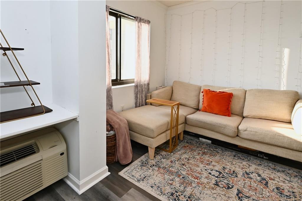 Living room featuring dark hardwood / wood-style floors