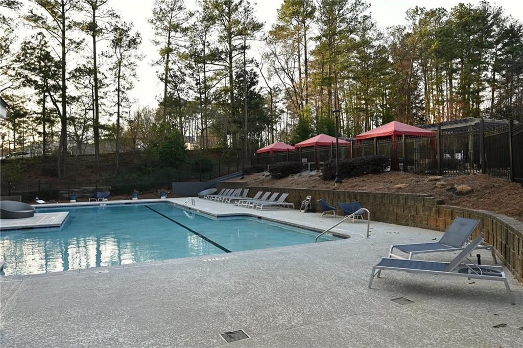 View of pool featuring a patio area