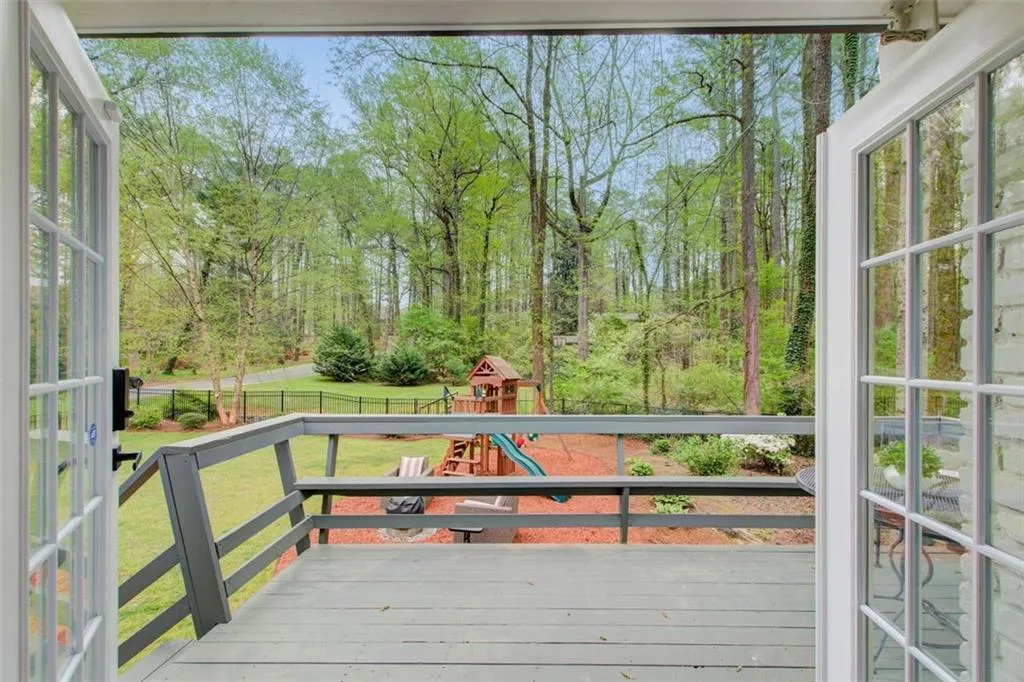Gorgeous French Doors lead from Great Room to your Outdoor Paradise
