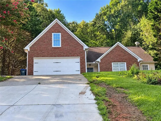 Brick exterior with gabled roof lines