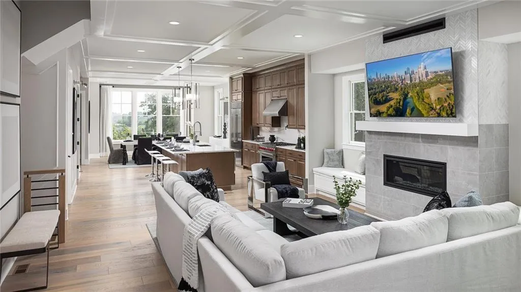 The open-concept kitchen and great room provide the ideal space for entertaining.THIS PHOTO IF OUR MODEL HOME  AT HIGHLANDS AT VININGS.