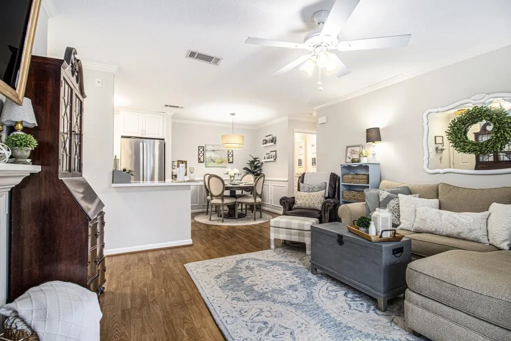 Step inside to Hardwood Floors, Crown Molding, Wainscoting in the Dining Room, and Light-Filled Spaces anchored by a cozy Fireplace.
