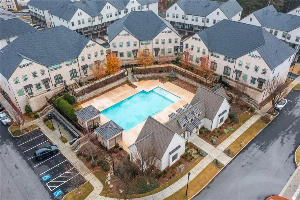 View of pool with a residential view