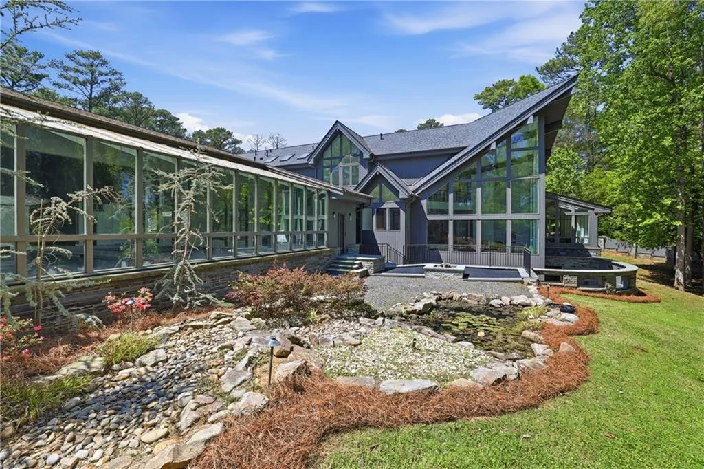 Contemporary exterior featuring expansive windows and a multi-level design