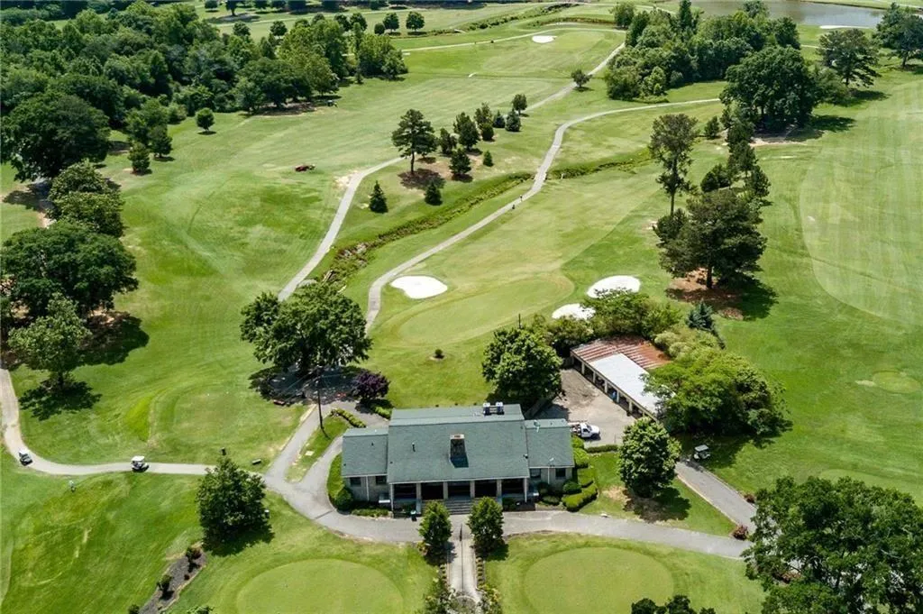 View of property location with a golf course