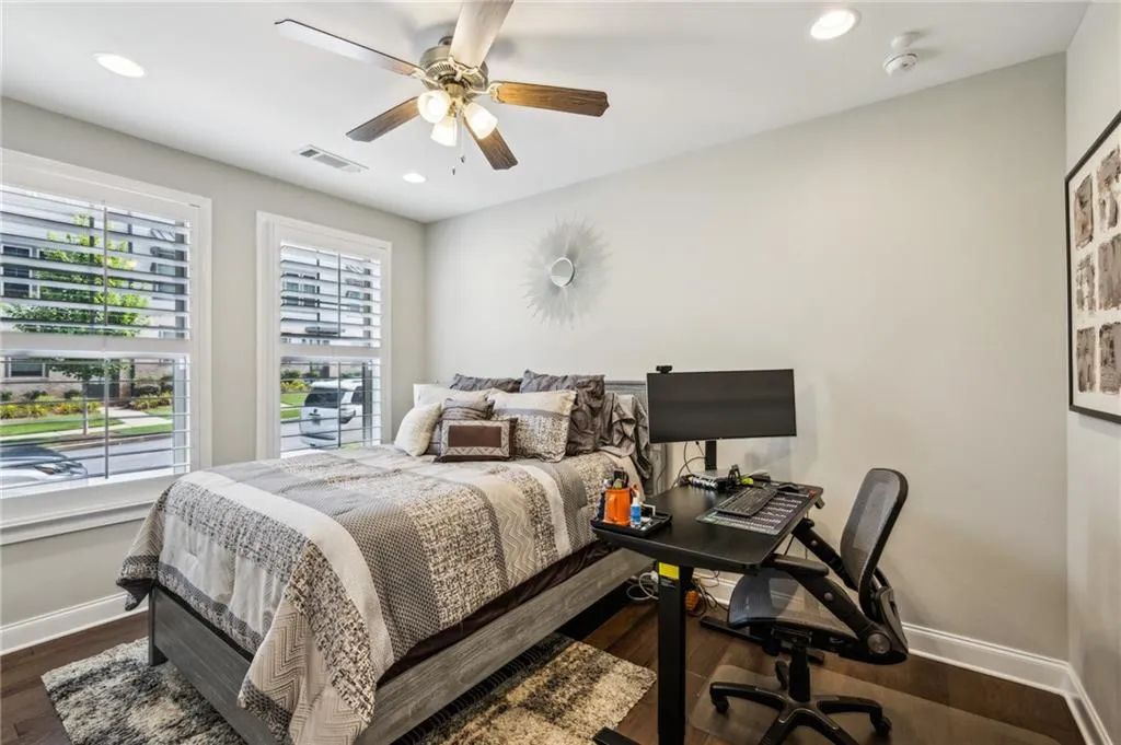 1st floor Bedroom with recessed lighting, dark wood flooring, ceiling fan,