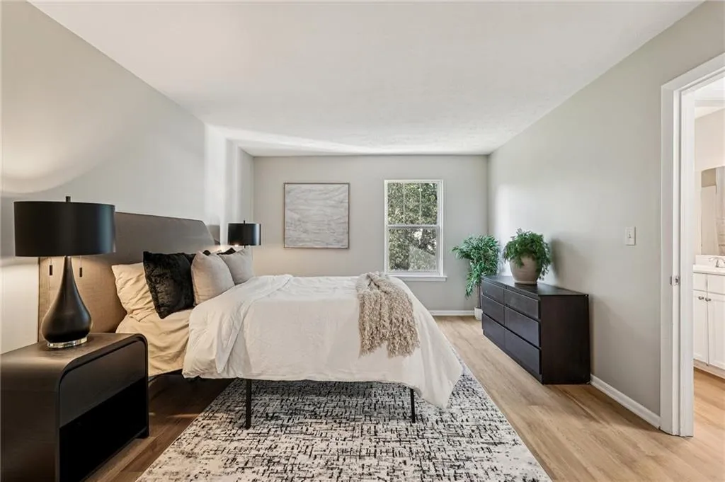 Bedroom with light wood-style floors