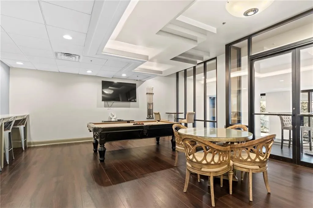 Game room featuring dark wood-style floors, billiards, and recessed lighting