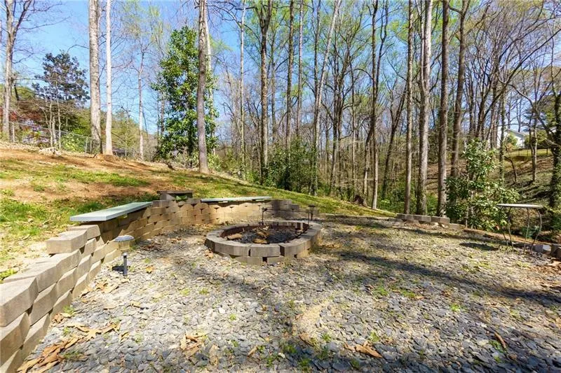 View of yard featuring a fire pit