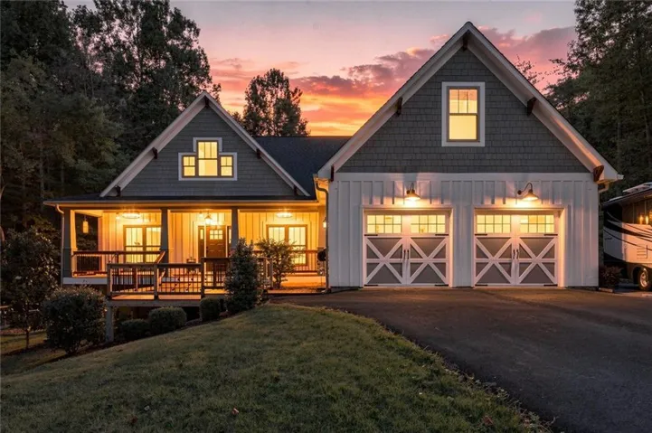 Gable roofline featuring shake siding and board and batten accents