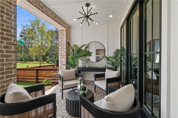 1.Sleek outdoor patio, offering the perfect spot to host friends and family in an open-air setting. *Photos are not the actual unit, but of the same floor plan and decorated model home.