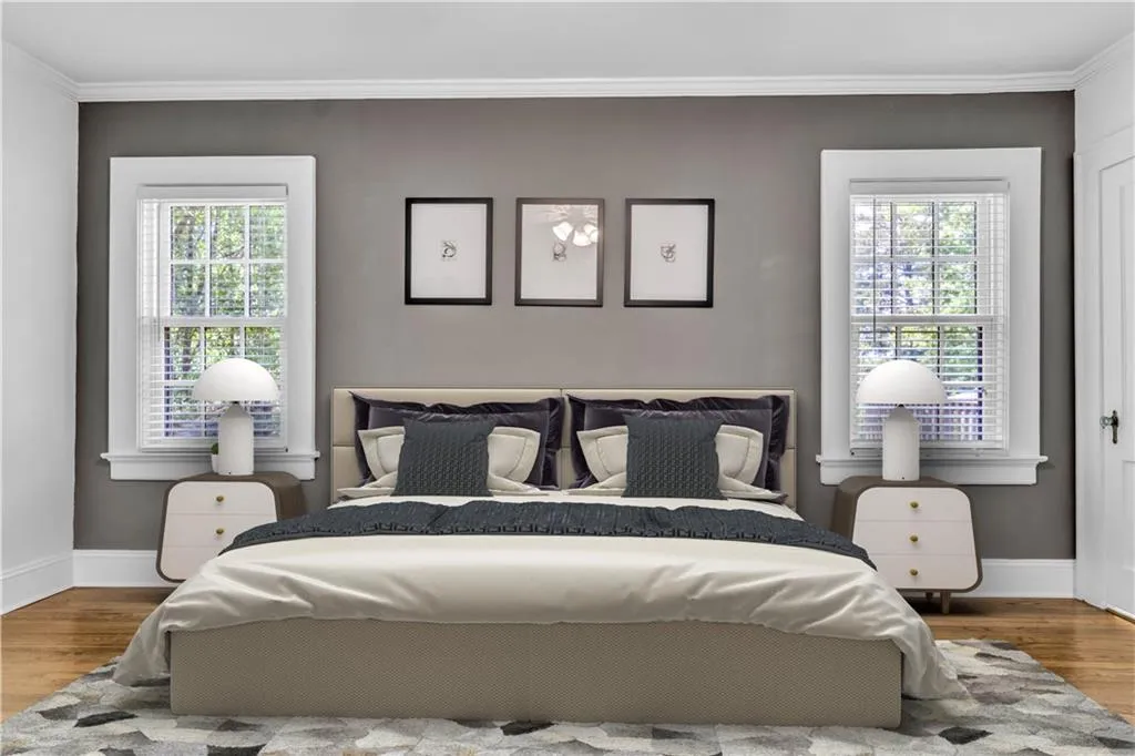 Second bedroom on main level (virtually staged)