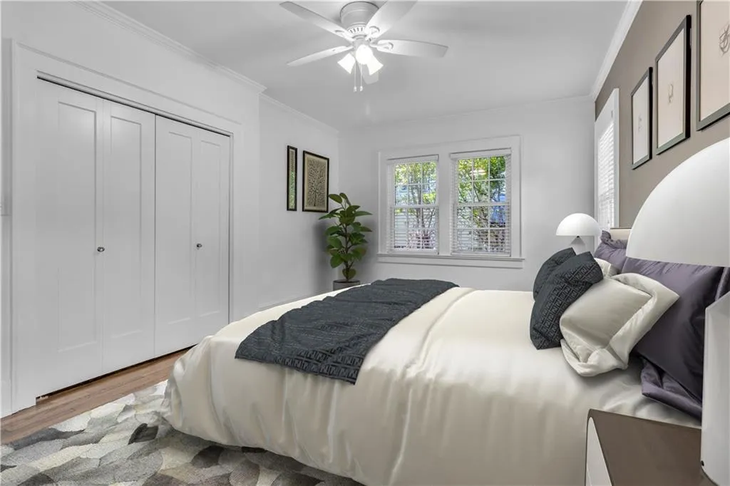 Additional view of second bedroom on main level (virtually staged)