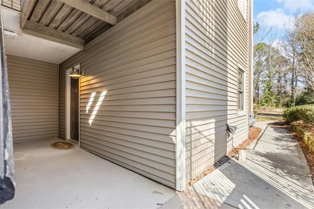sidewalk from parking lot leading to the front door that is private and not a shared area