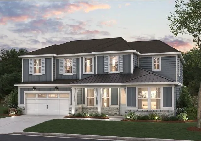 Two-story residence featuring a dark shingle roof, blue horizontal siding, white window trim, and a white garage door with upper window panels