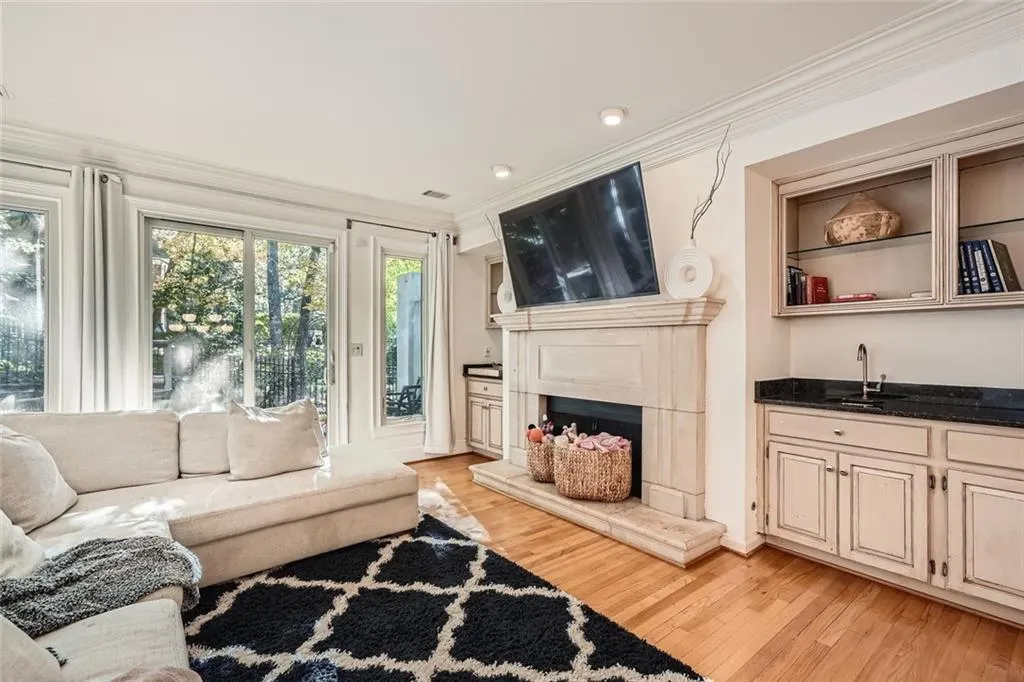 Over-sized, fire-side family room with backyard access.