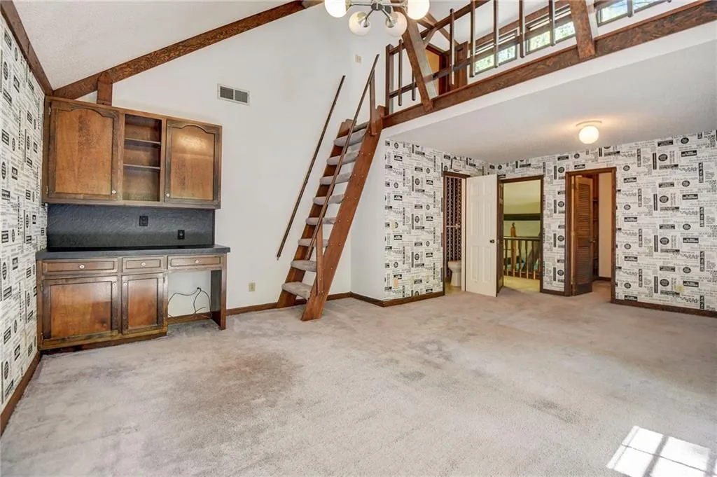 Bedroom with Loft  with lwalk in closet lower level Jack and Jill bath  and high vaulted ceiling