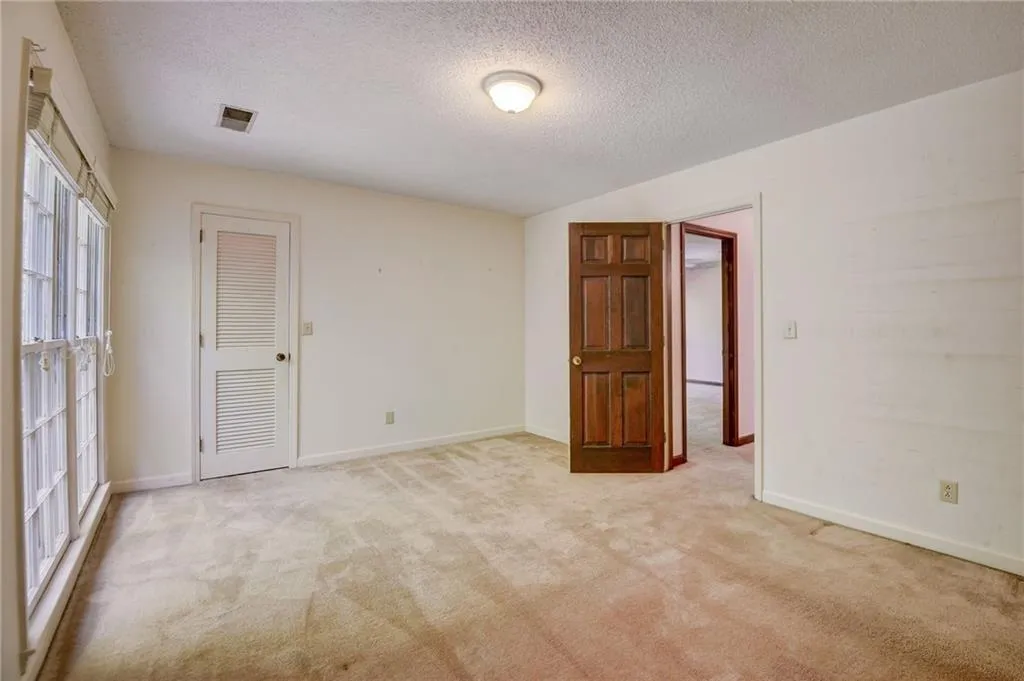 Bedroom with walk in closet