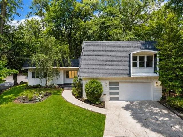 Front picture has had green grass feature added with AI.  Currently pine straw down on front yard.