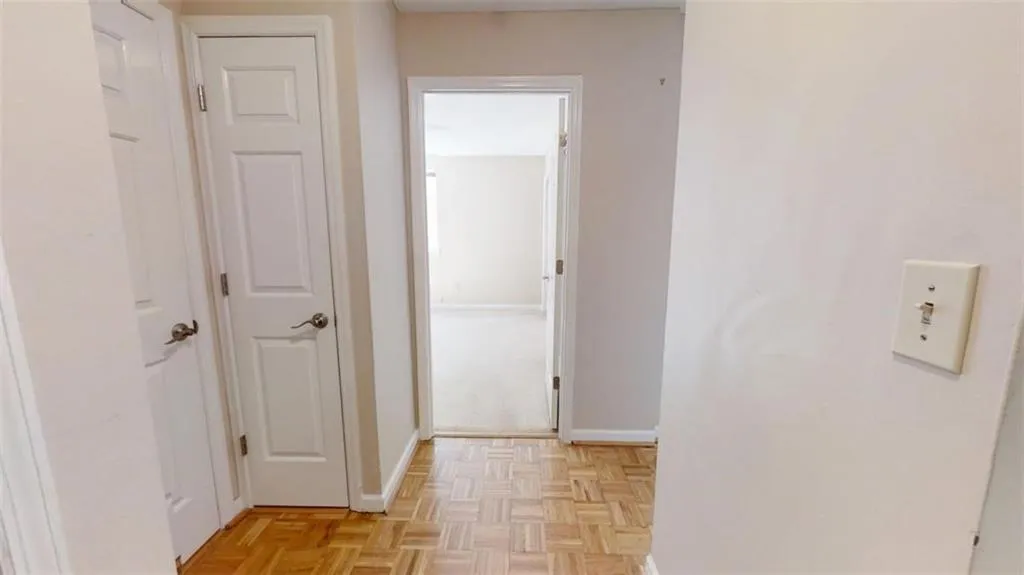 Hall featuring baseboards