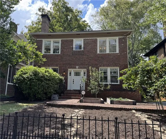 Brick exterior with a prominent chimney