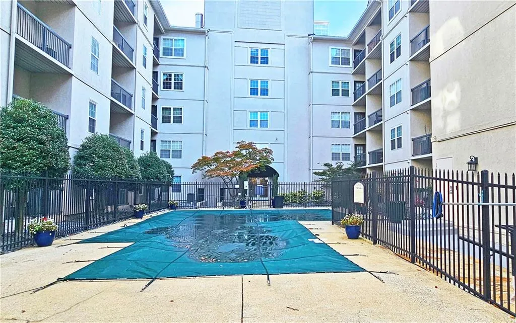 Community pool with fence