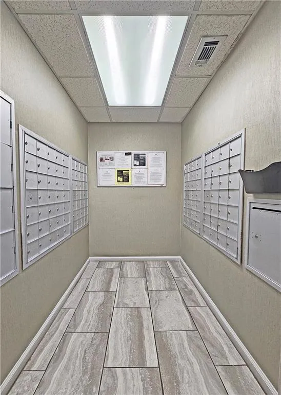 View of property's community with mail area and visible vents