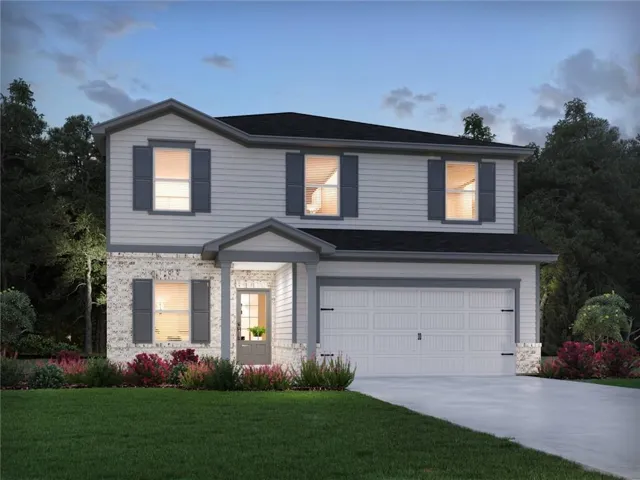 Two-story residence featuring light gray siding with white brick accents, a covered entry porch, dark gray shutters, and a two-car garage