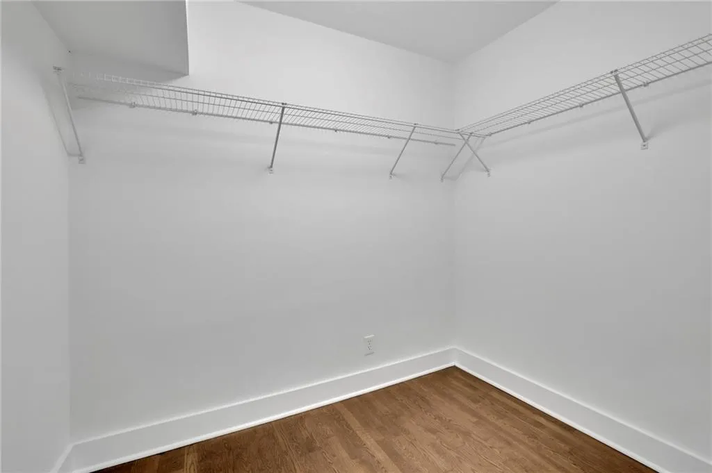 Primary walk-in closet 1