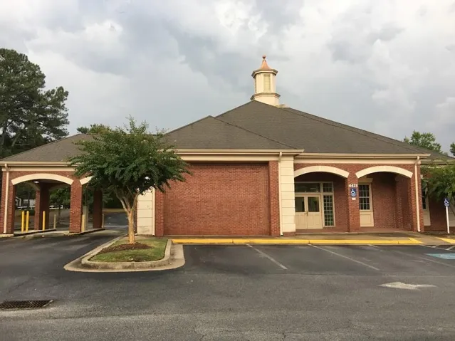 Brick front with Drive through