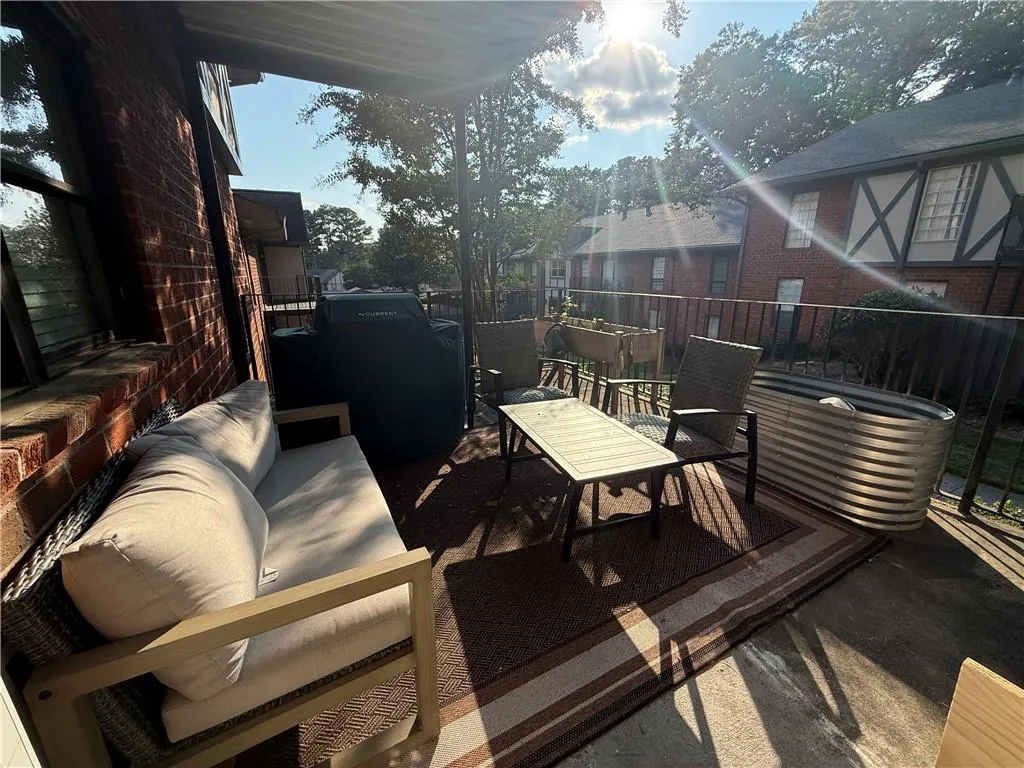 View of patio with area for grilling