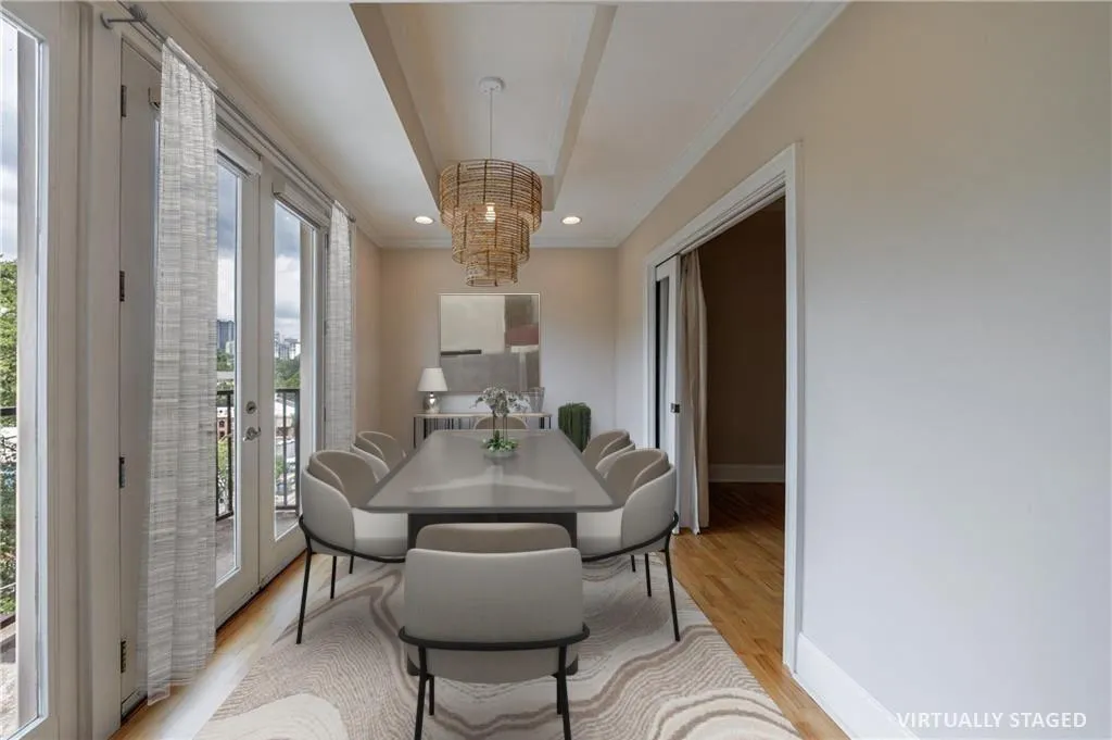 Dining room opening onto balcony.