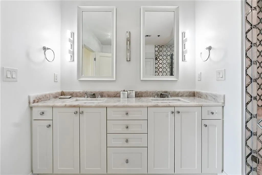 Bathroom featuring double vanity
