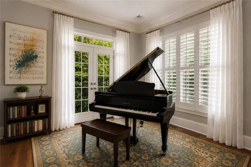 Sitting room at front of house is a perfect place for a piano