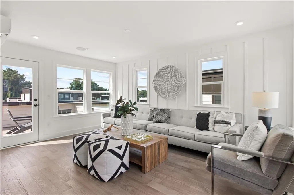 4th floor Loft featuring light wood-style floors and recessed lighting
