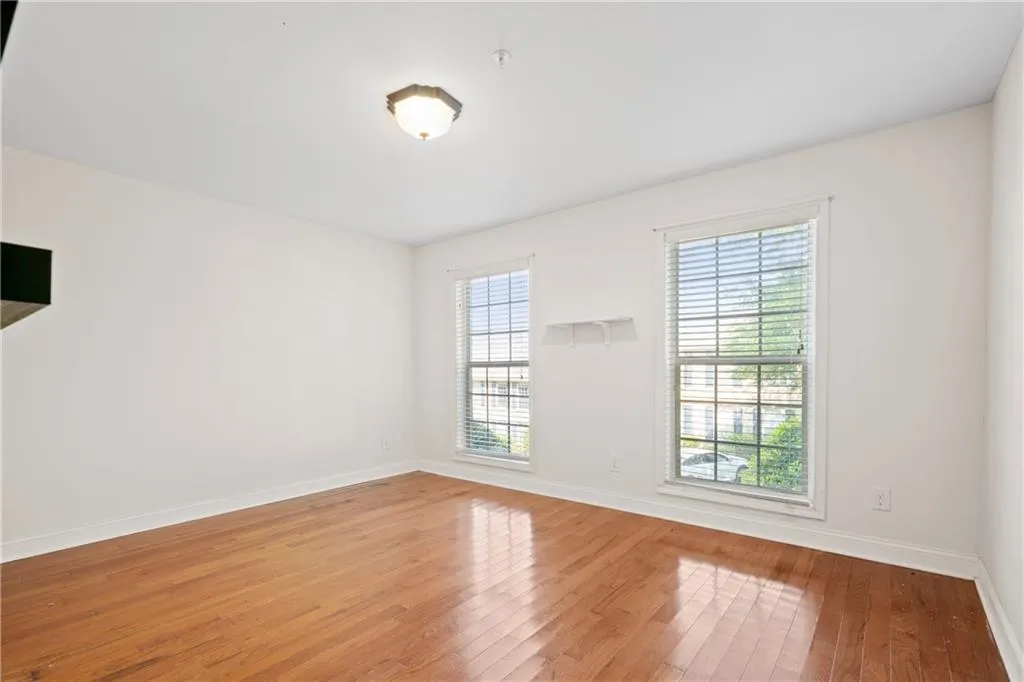 Unfurnished room featuring light wood-type flooring