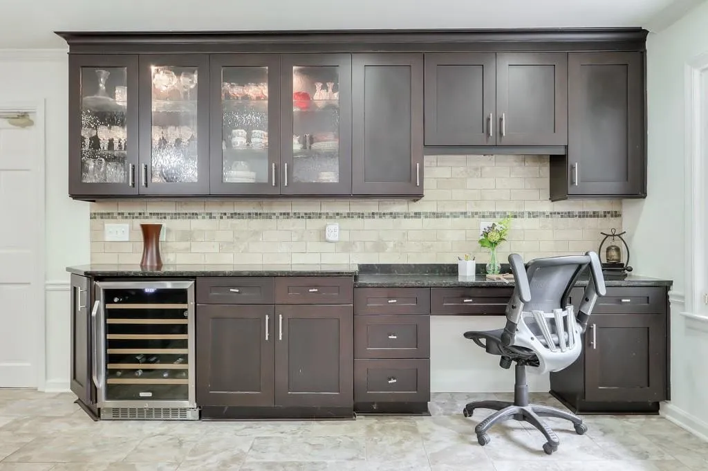 Kitchen featuring a desk and wine cooler