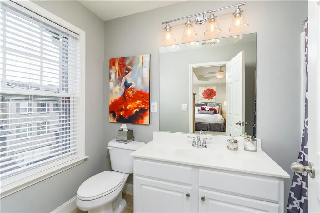 Bathroom featuring vanity and ensuite bathroom