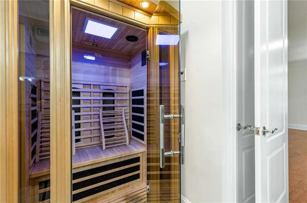 The custom relaxing sauna is a unique feature of this bathroom.  The other 2 bathrooms have tub/shower combinations.  If you prefer a tub over the sauna the original plumbing is capped under the sauna so a tub can be installed.