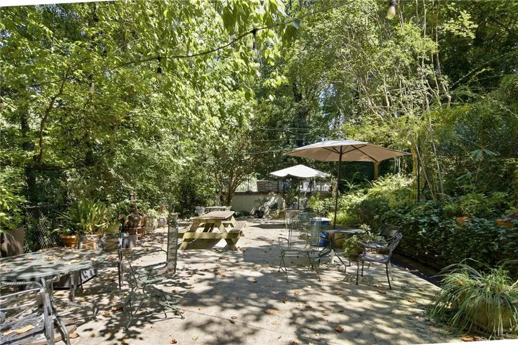 Expansive outdoor patio area featuring a concrete surface