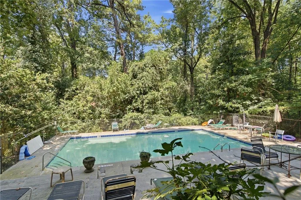Outdoor swimming pool with concrete surround