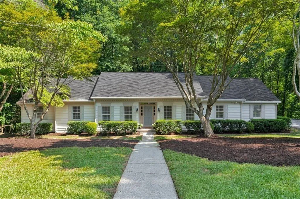 Newly painted ranch style home nestled on over 2+ acres