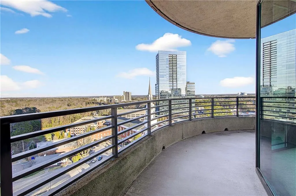 Balcony featuring a view of city