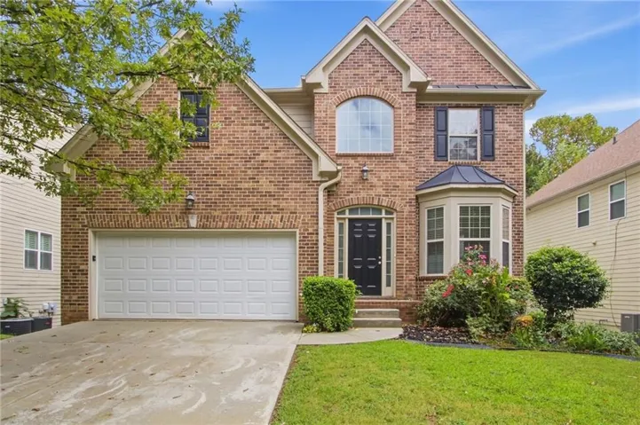 Brick facade with arched window accents